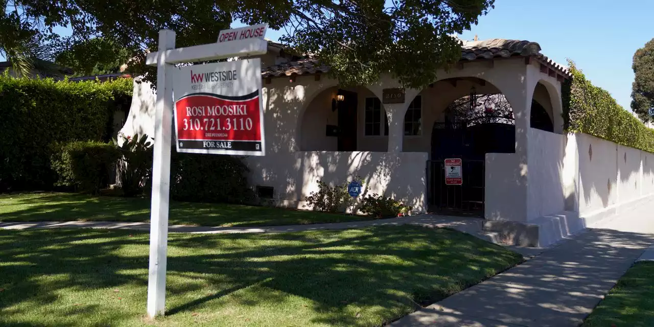 Mortgage rates surge to a 20-year high, leading to steep decline in home sales