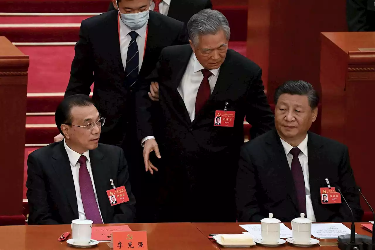 Ex-Chinese President Hu Jintao forced from party congress, erased from internet as Xi solidifies power