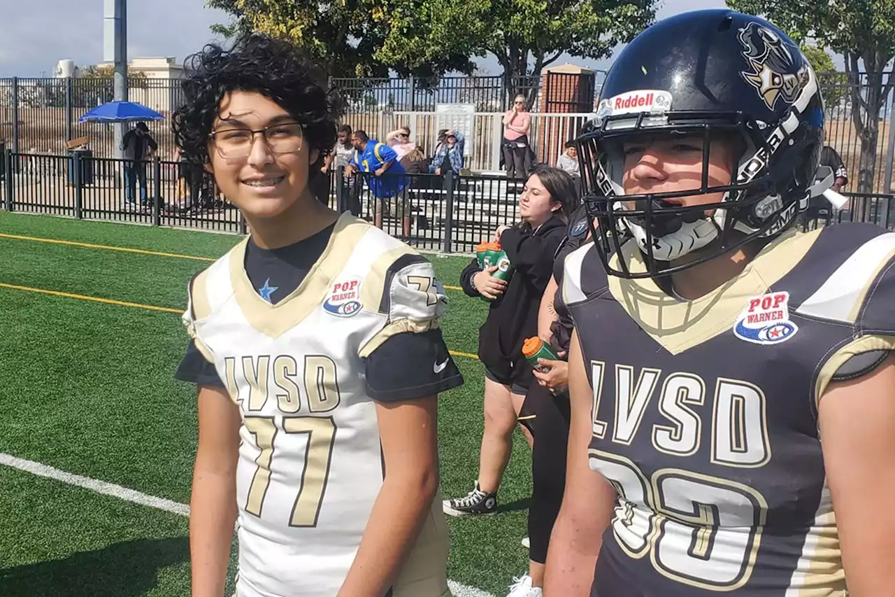 Football player, 13, who suffered heart attack during game returns home