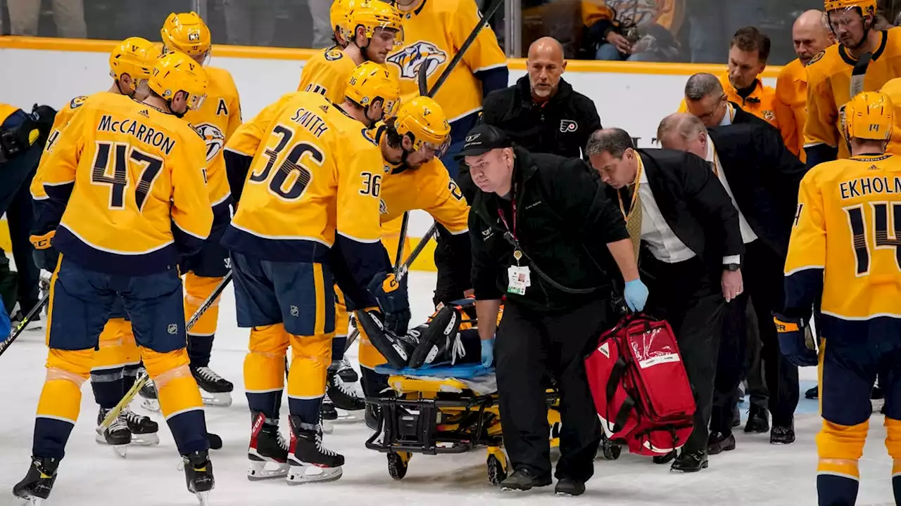 Predators defenseman Mark Borowiecki stretchered off ice after awkward hit into boards