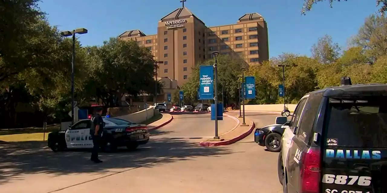 Two people shot inside Dallas hospital; suspect in custody