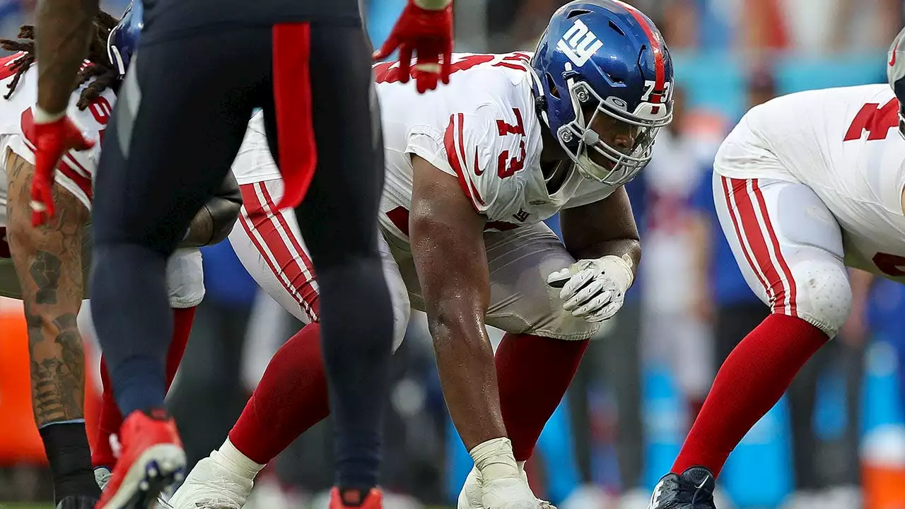 Giants' Evan Neal could miss time with knee injury, tight end heads to hospital after being poked in eye