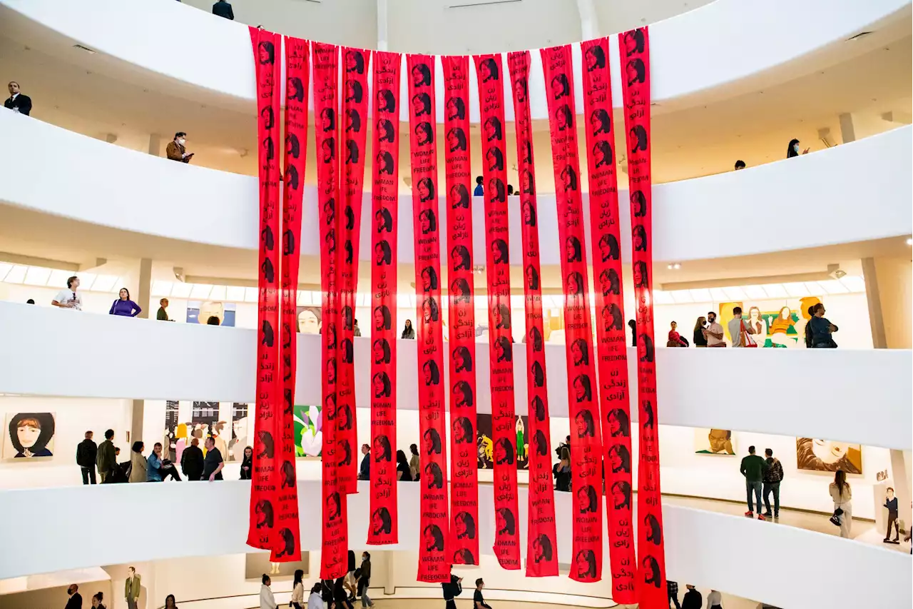 Artists Unfurled Red Banners From the Guggenheim Rotunda to Support the Iran Women's Protest Movement | Artnet News