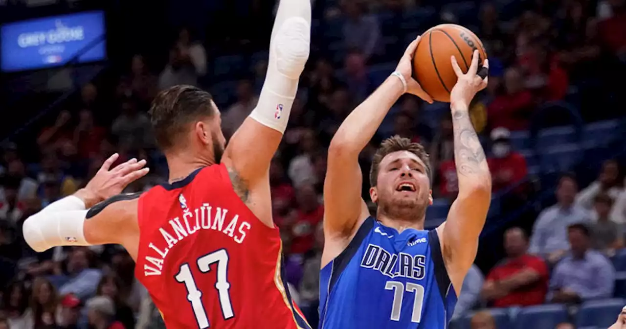 Murphy leads under-manned Pelicans past Mavericks, 113-111