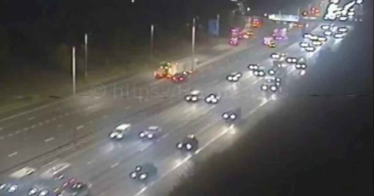 M1 delays reported after car crashes into barrier