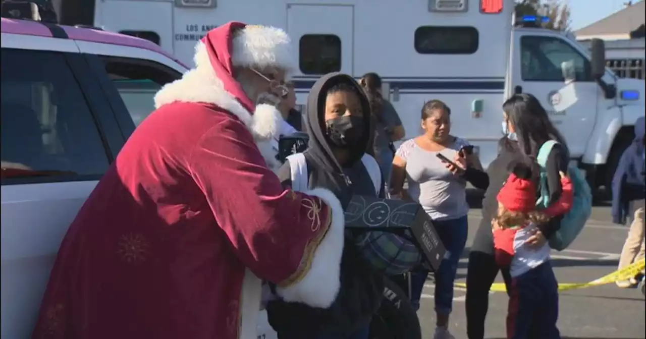 LAPD holds toy giveaway for South LA residents after arsonist burns down beloved church