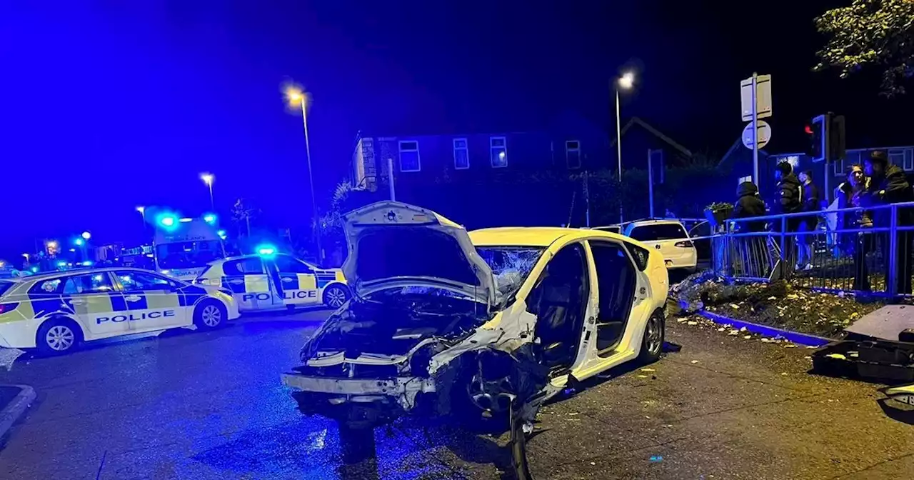 Man cut from vehicle with saw after two-car smash on busy main road