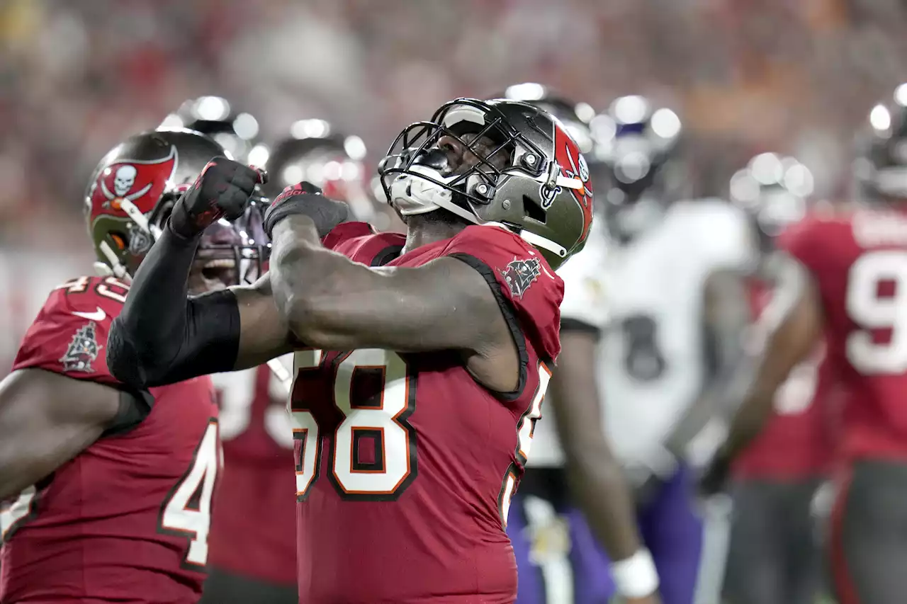 Jackson shines, Ravens beat Brady, struggling Bucs 27-22