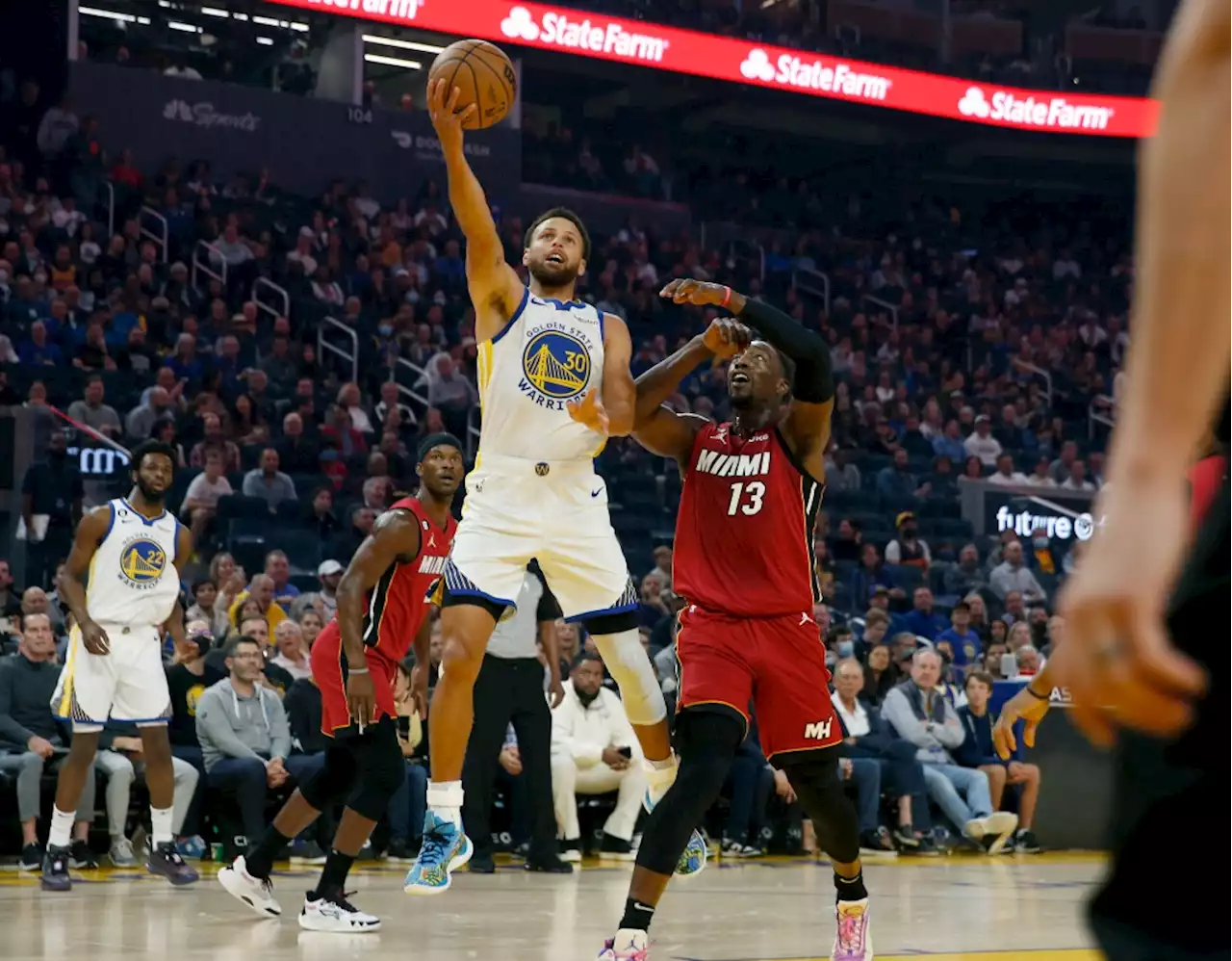 Steph Curry leads Warriors to win over Heat