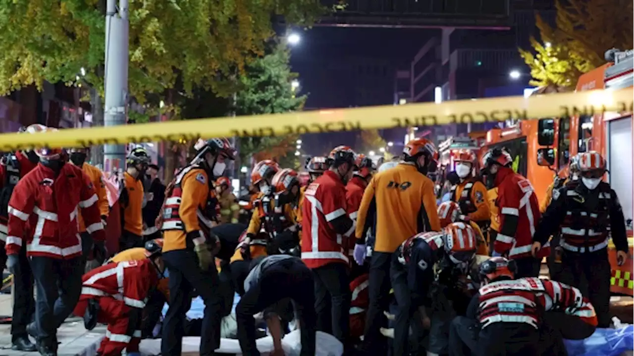 Officials: 9 dead after Halloween crowd surge in Seoul