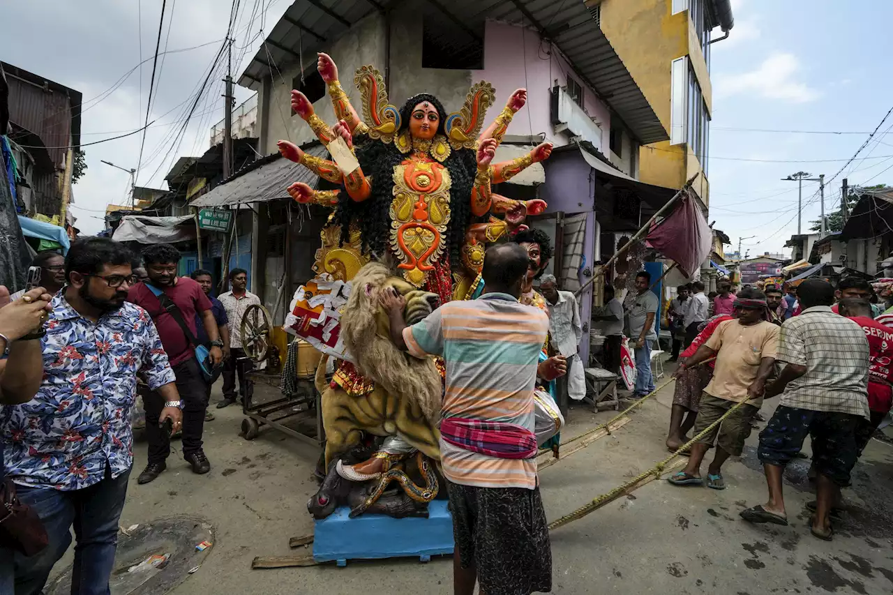 AP PHOTOS: Kolkata artists paint, mold idols for Durga Puja