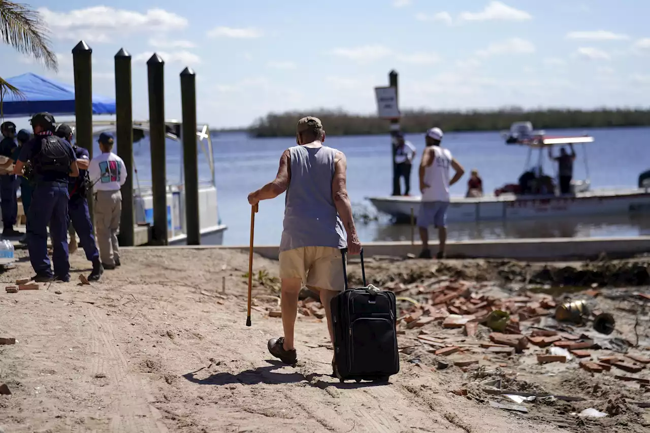 Feds vow major aid for Hurricane Ian victims amid rescues