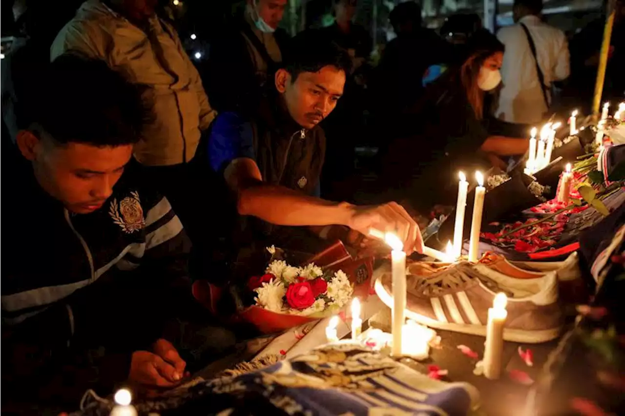 Indonesia soccer stampede kills 125 after police use tear gas in stadium