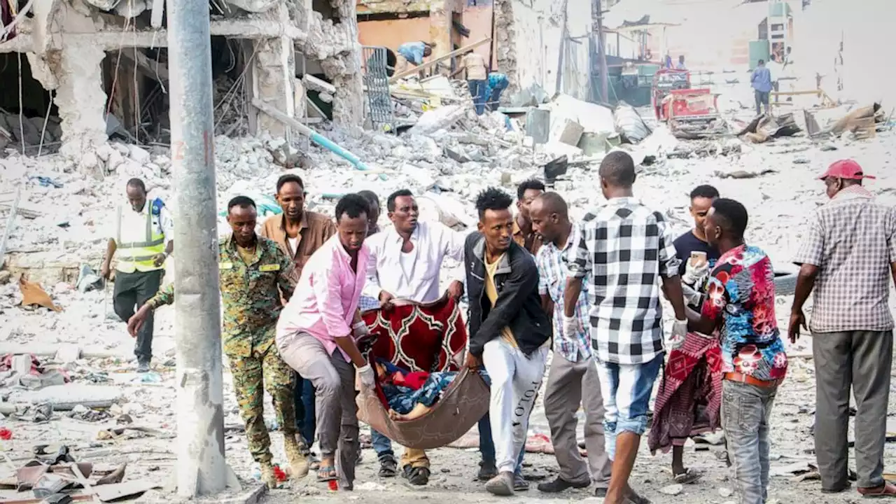 Somalia's president says at least 100 killed in car bombings