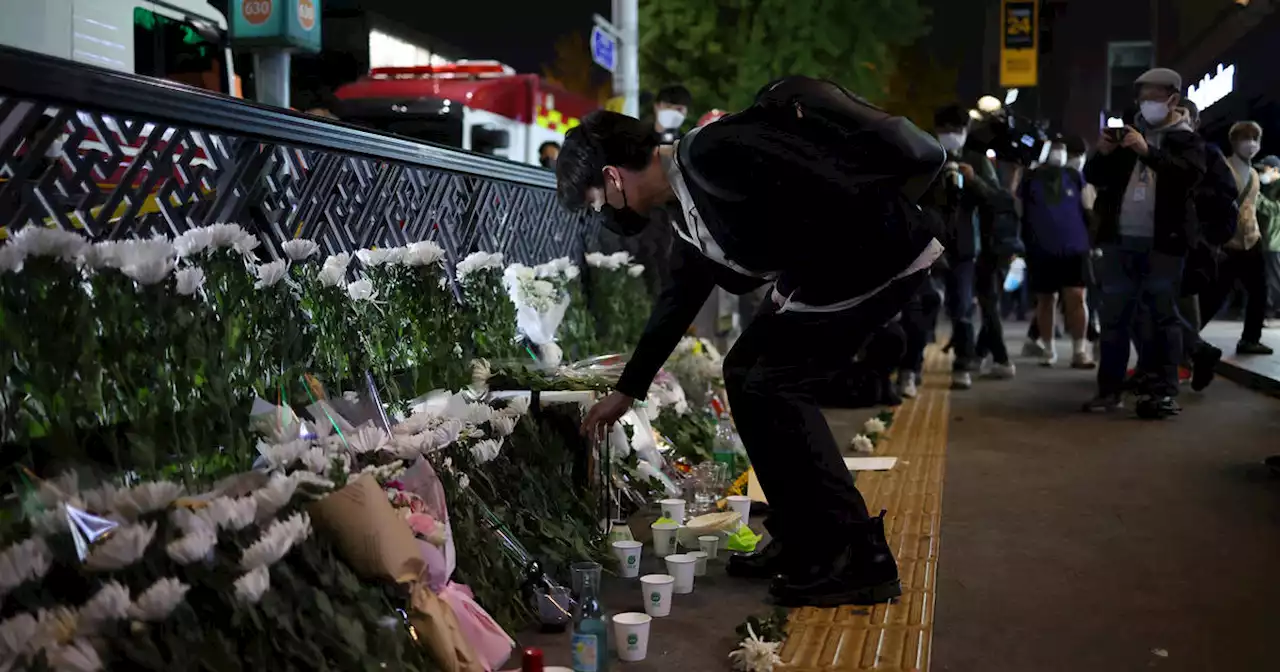 South Korea in shock and grieving after 153 die in Halloween crowd surge