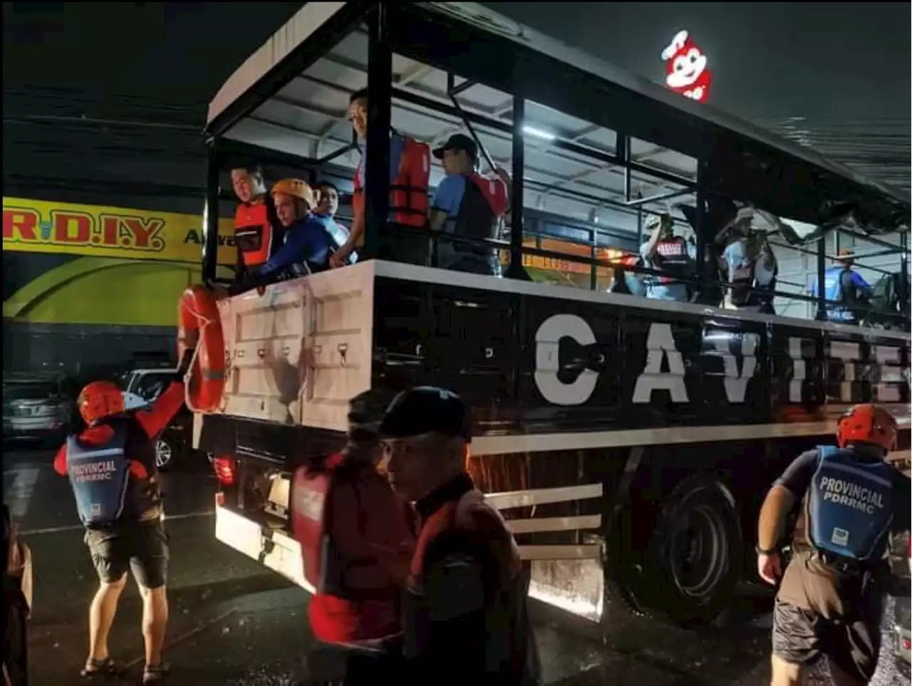 River wall in Noveleta, Cavite collapses; flood victims wait for rescue from roof-tops