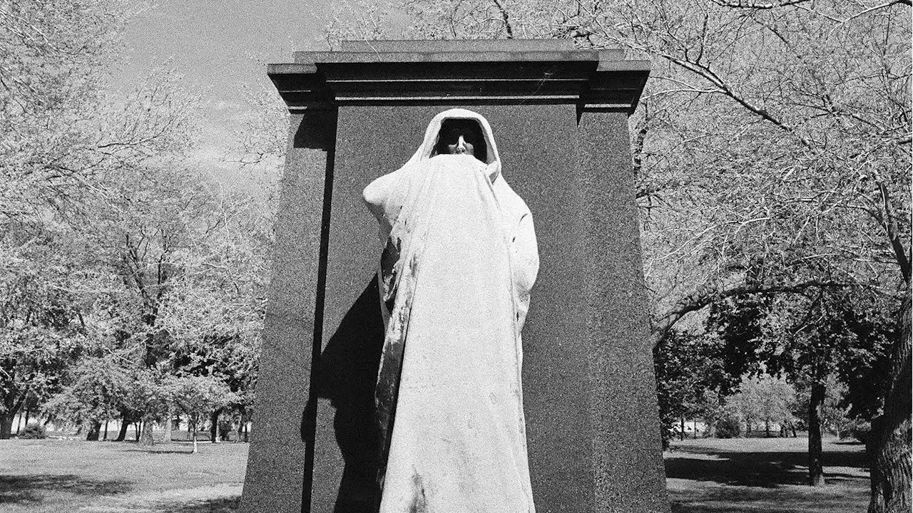 The Eerie Legend of Graceland Cemetery’s “Eternal Silence” Statue