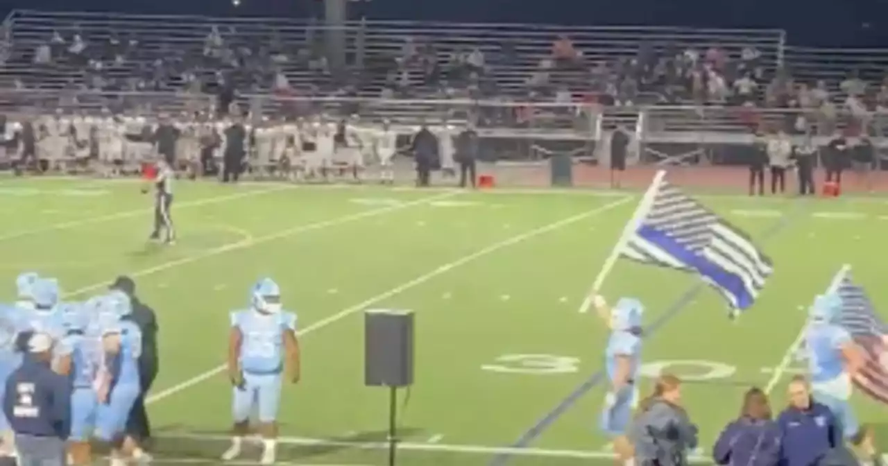 Controversy continues after Saugus High School players run 'Thin Blue Line' flag onto field