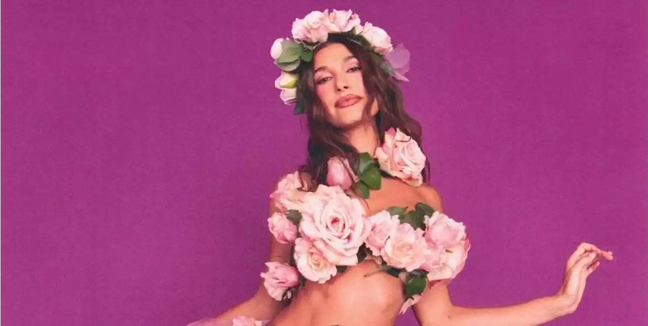 Hailey Bieber Covers Herself in Pink Roses for Ethereal Halloween Look