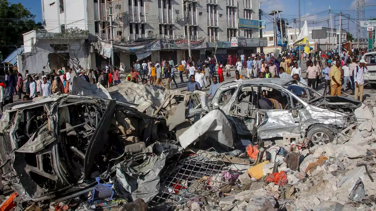 Somalia's president says at least 100 killed in car bombings