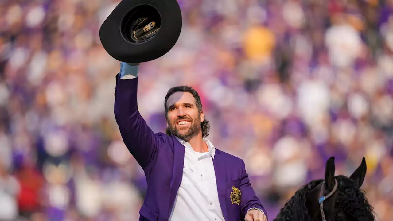 Giddy up! Jared Allen emerges on horseback for ceremony inducting him into Vikings' Ring of Honor