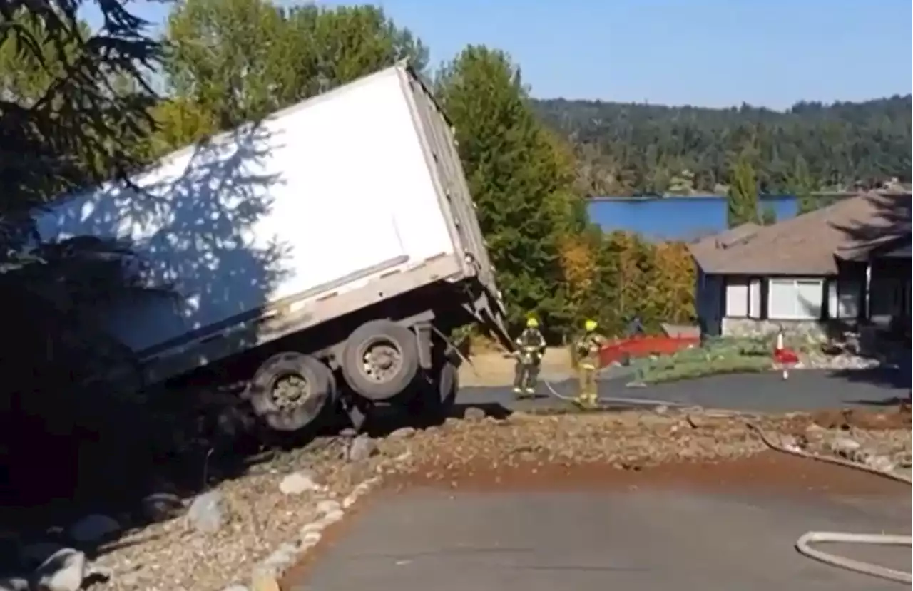 Emergency crews on scene after semi truck crashes into house in Nanoose Bay: RCMP