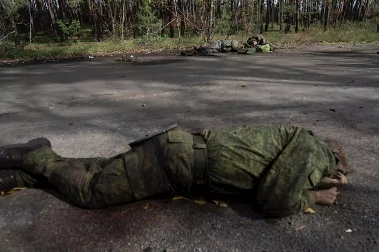 Retreating Russians leave their comrades’ bodies behind