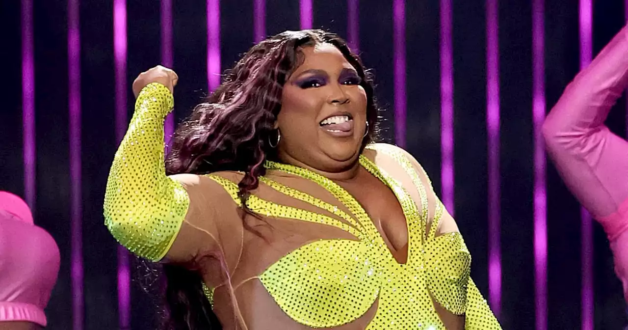 Lizzo's Tour Outfits Include a Neon, Sheer-Paneled Catsuit Covered in Rhinestones