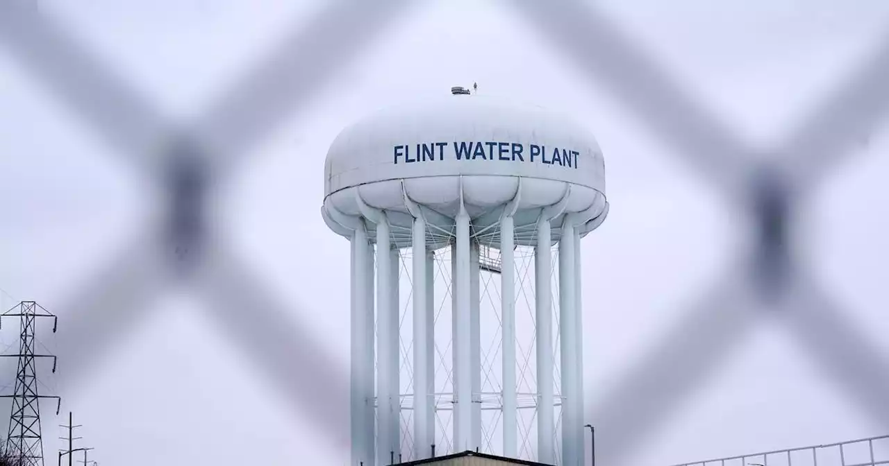 Judge dismisses charges against 7 people in Flint water crisis