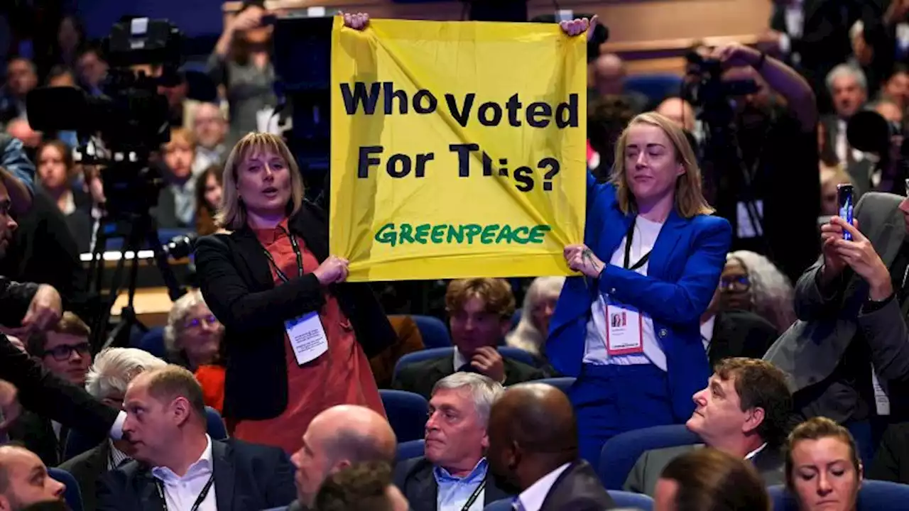 Greenpeace campaigners disrupt Liz Truss's party conference speech | CNN