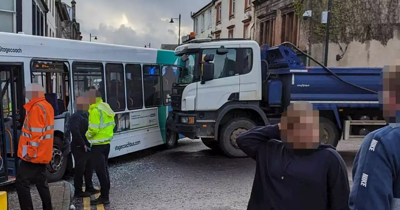 Six people rushed to hospital after bus and truck collide on busy Ayrshire road