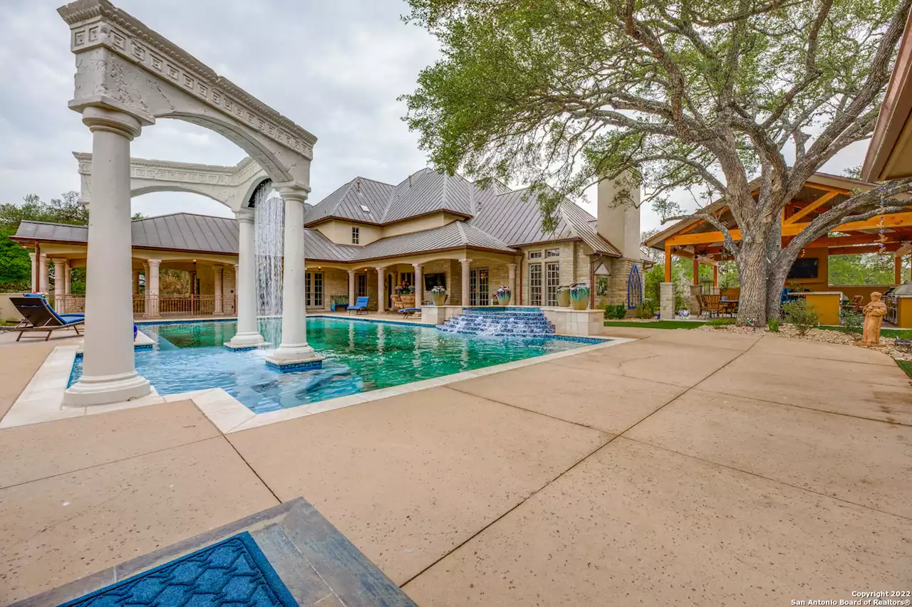 This $4.9M Hill Country estate has a pool with Roman-style columns and waterfalls