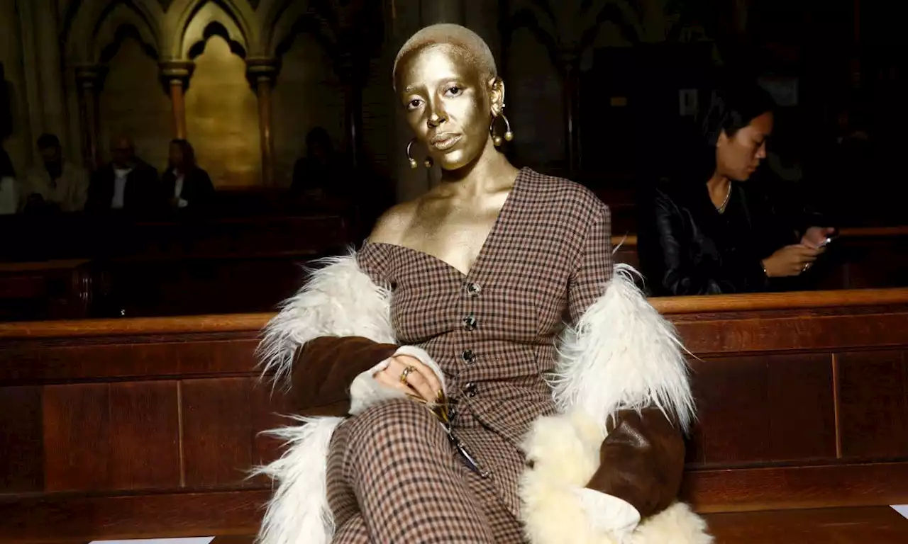 Yes, Doja Cat just painted herself gold at Paris Fashion Week