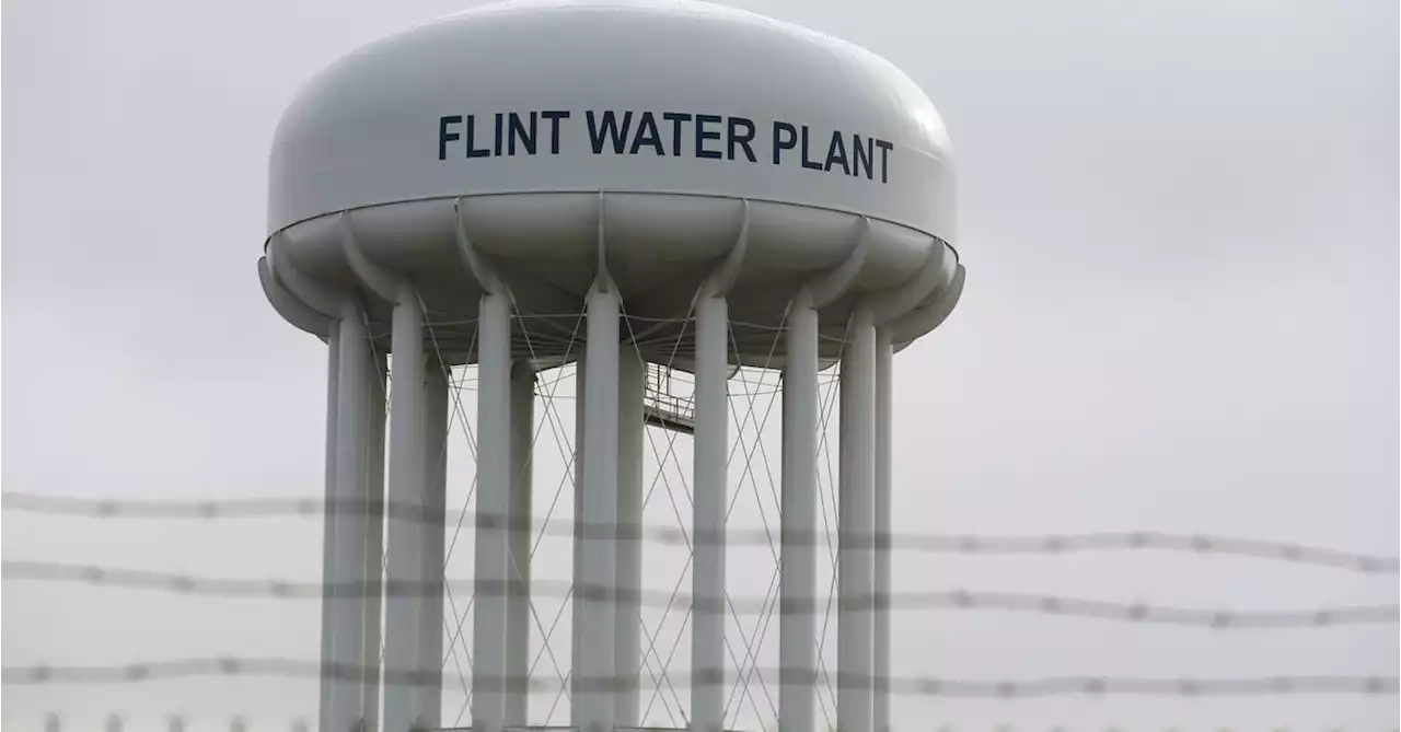 Michigan judge drops charges against 7 ex-state and city officials in Flint water crisis