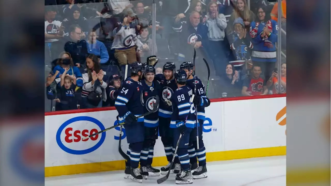 Jets dominate Flames behind Rittich's 37 saves, four second-period goals in 5-0 win