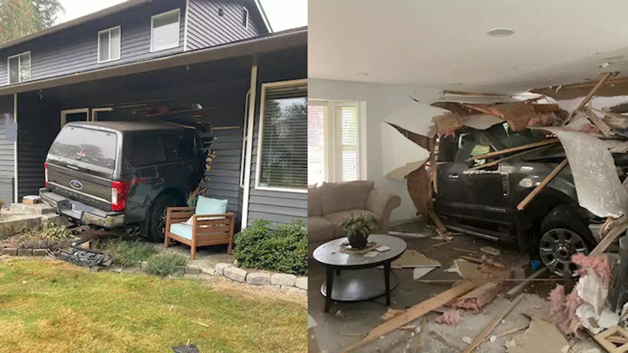 PHOTOS: Truck crashes through Snohomish house, no injuries