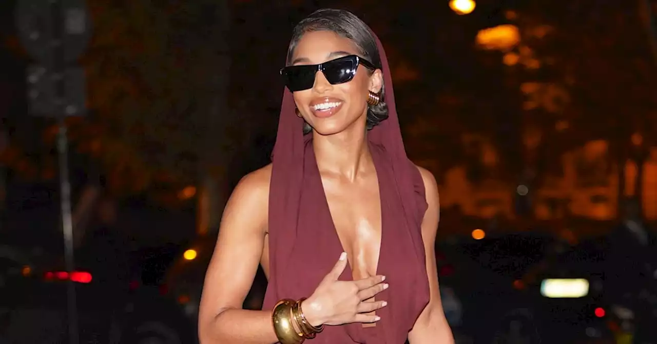 Lori Harvey Styled a Plunging Hooded Dress With Heels For Beyoncé's Party