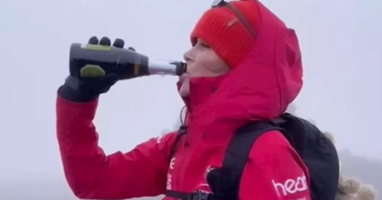 Amanda Holden downs bubbles on mountain after completing Three Peaks challenge