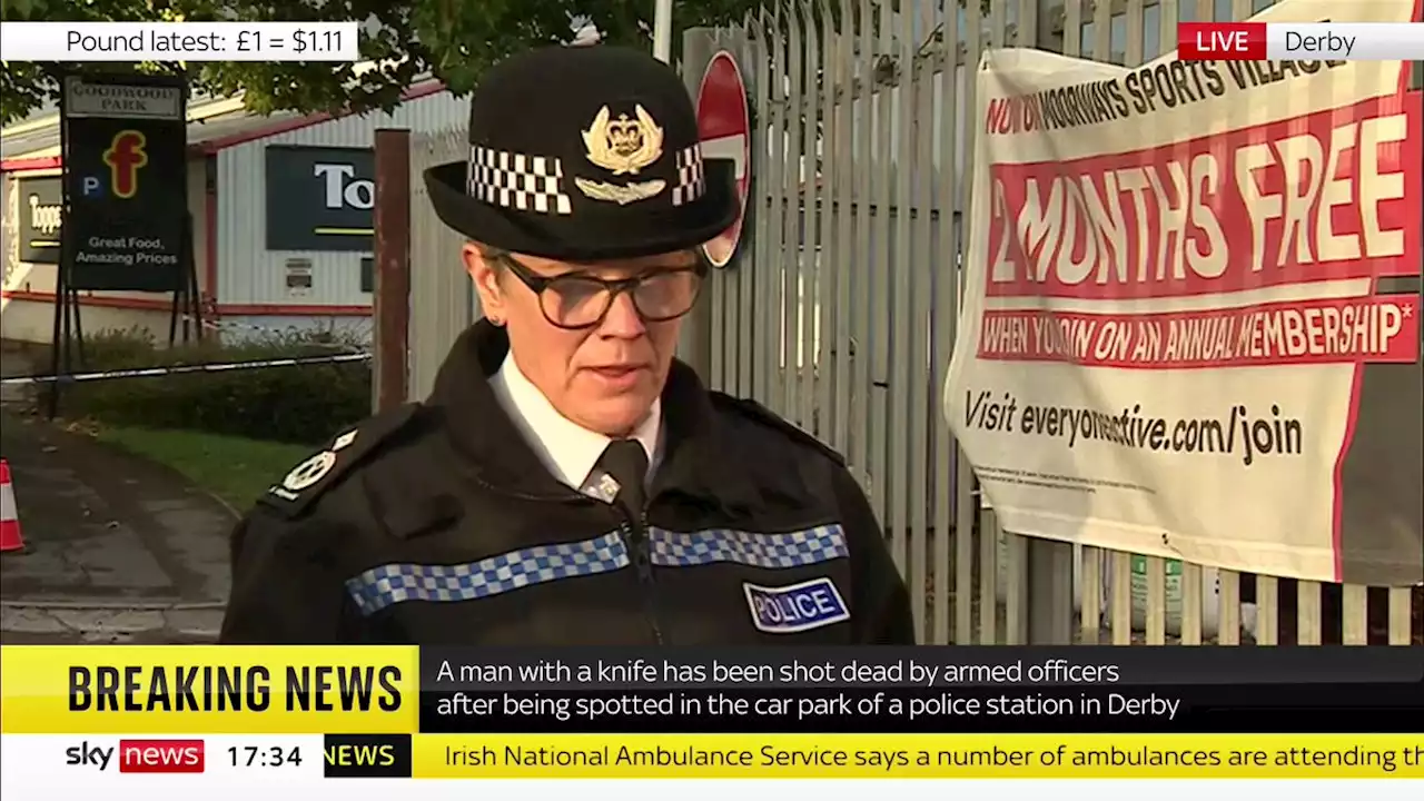 Man with knife dies after being shot by armed officers in police station car park