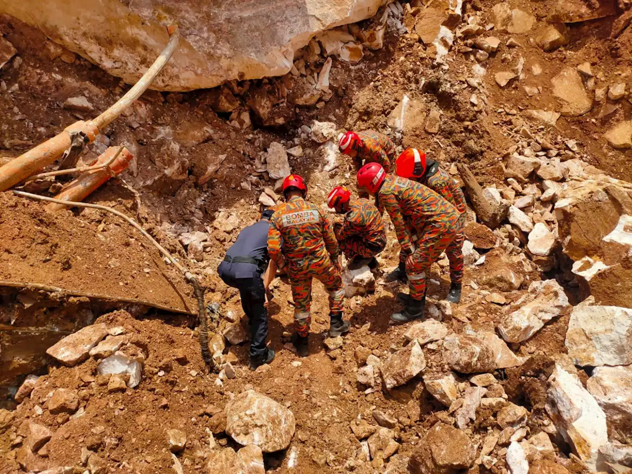 Two months before families of rockfall victims can claim remains, say cops