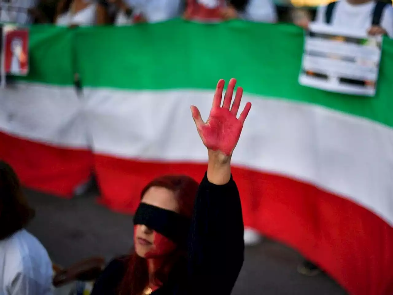 Women students tell Iran's president to 'get lost' as unrest rages