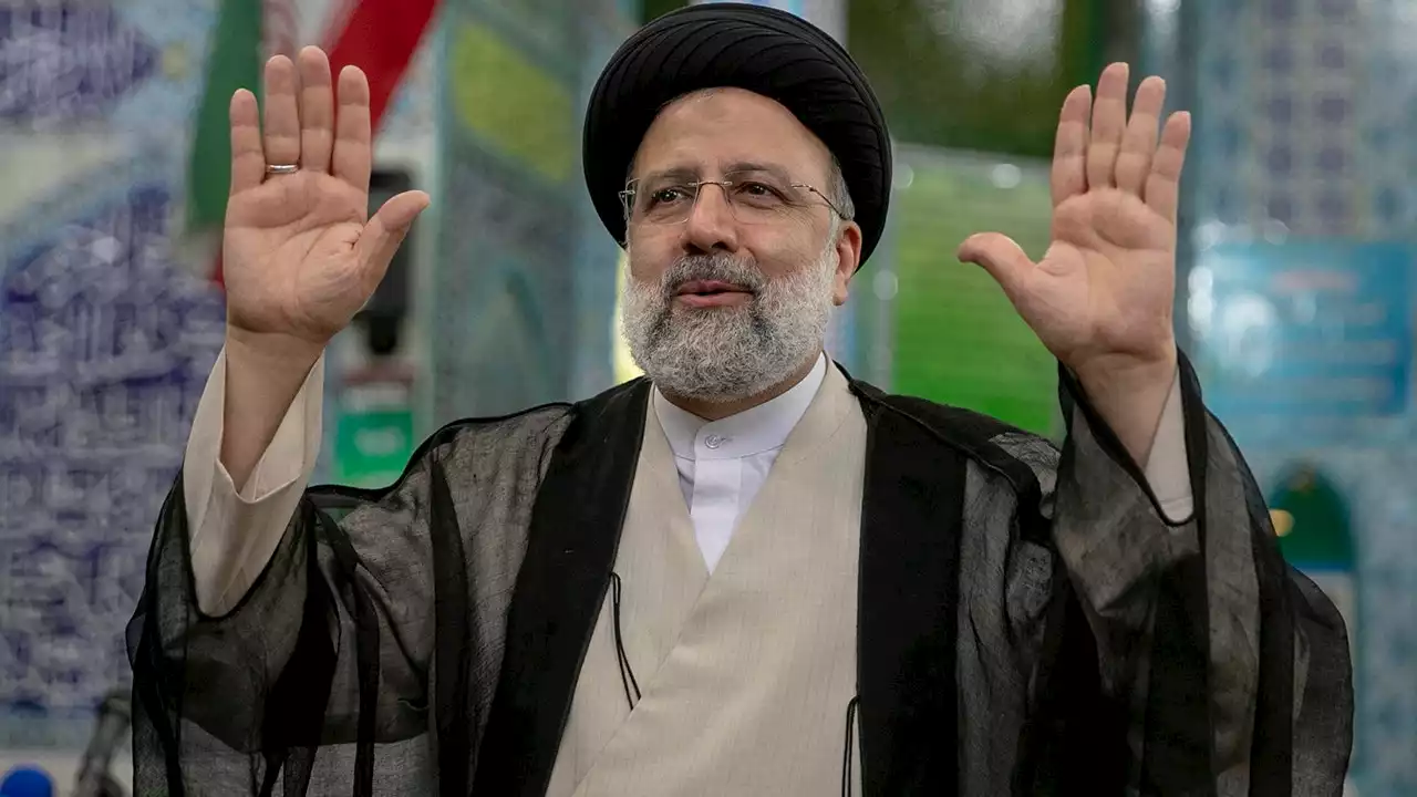 Female students shout at Iranian president to 'get lost' as he condemns protests