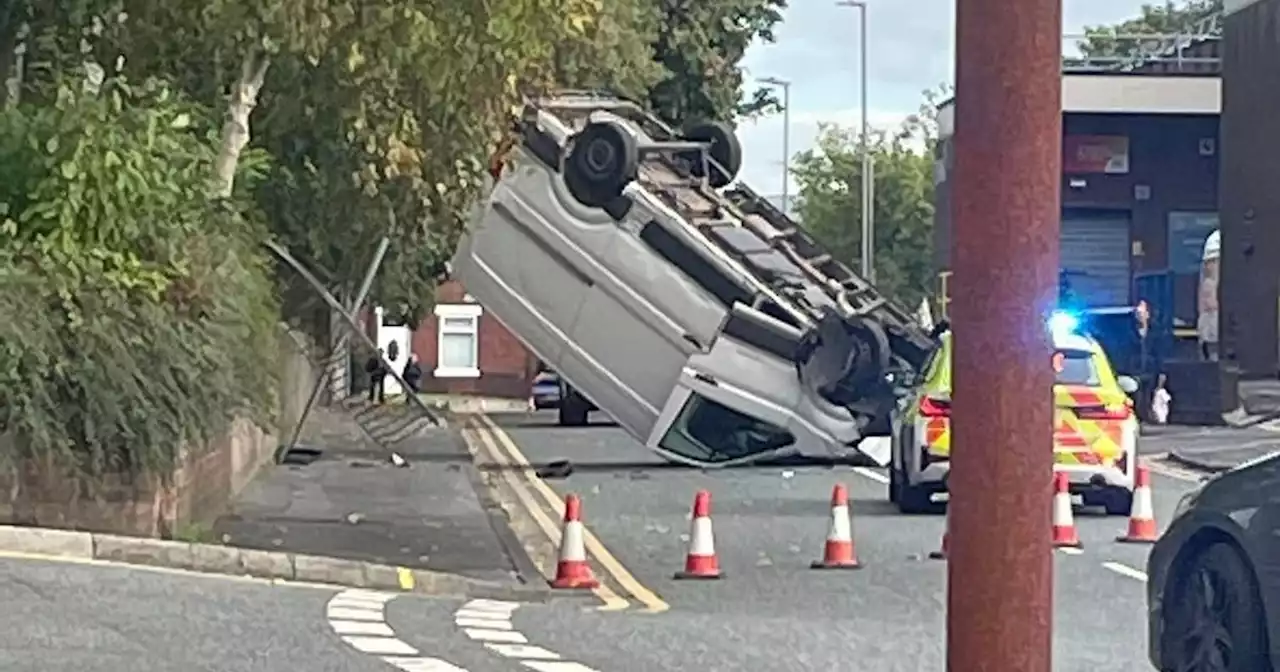 Arrest after police chase ends with van on its roof behind shopping centre