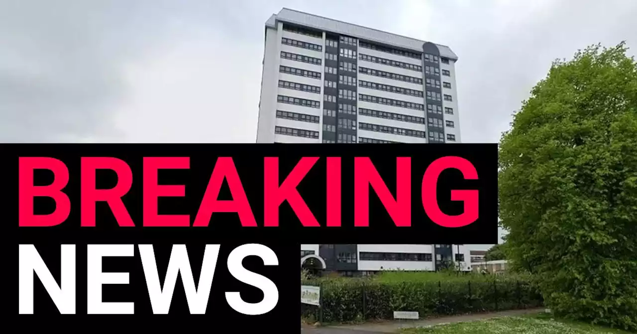 Murder investigation launched after body found dumped in block of flats