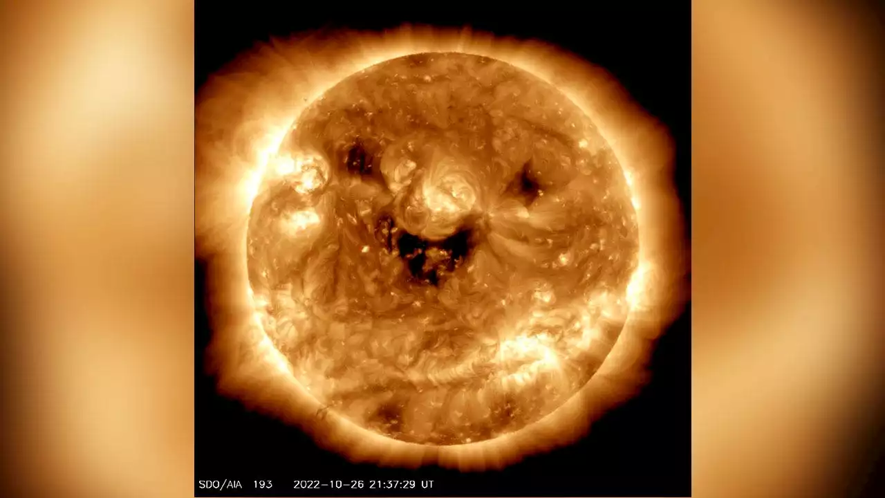 NASA takes image of 'smiling' sun – but it's no laughing matter