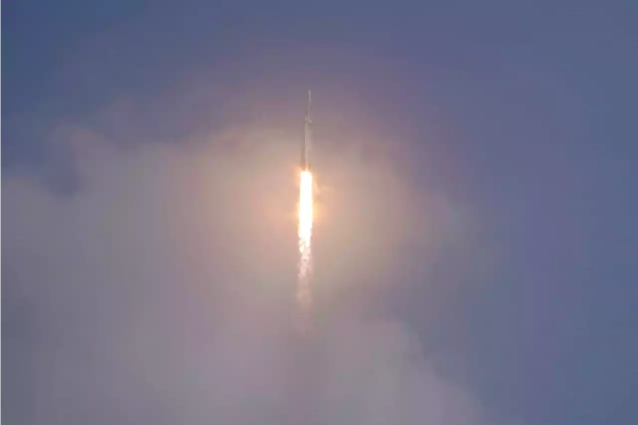 SpaceX nails booster landings after foggy military launch