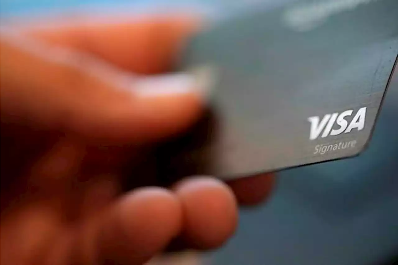 Credit card debt at record high amid stubbornly hot inflation, survey says