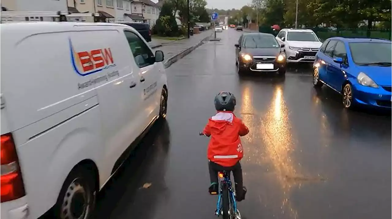 Sajid Javid blames father of five-year-old cyclist for letting child ride on road in viral video