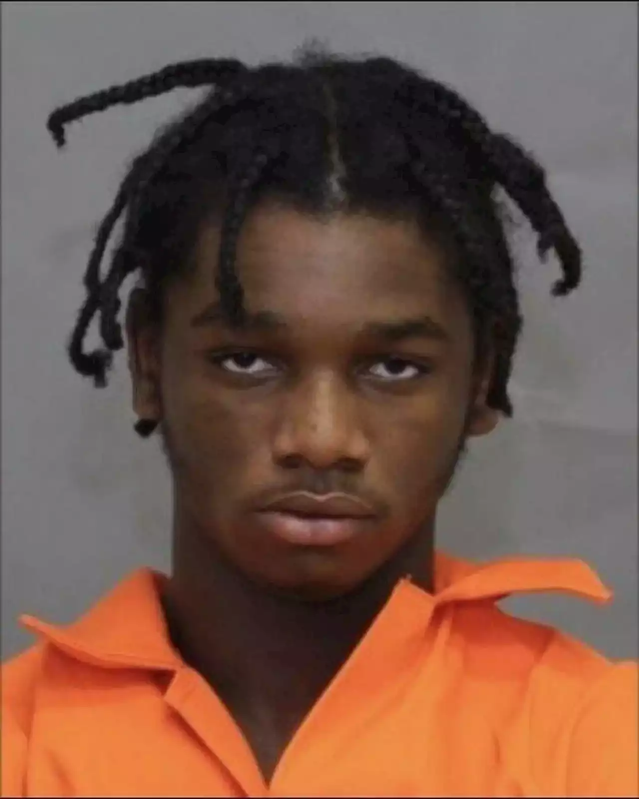 Video shows accused on trial for multiple murders re-enacting key scene in courtroom