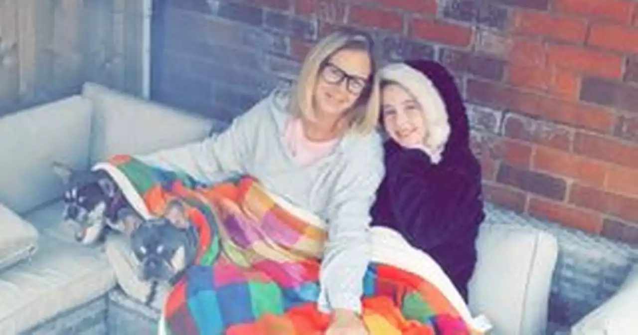 Watch moment Belfast woman tells daughter 'mummy is cancer free'